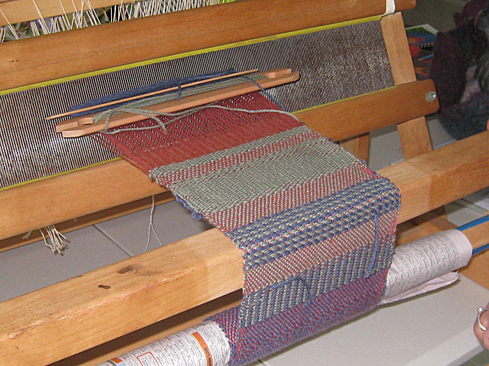 Students samples on the loom
