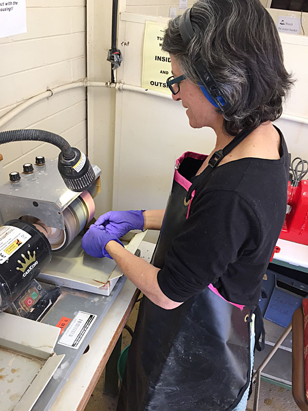 Fiona polishing some stones on the Lap Wheels